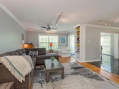 Living room seating and a balcony door